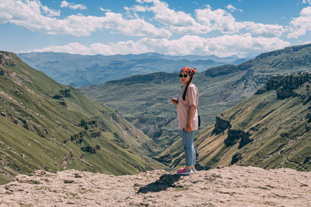 girl near the gorge in the mountains, Dagestanの写真素材