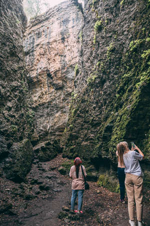 A female backpacker walk in the canyon.の写真素材