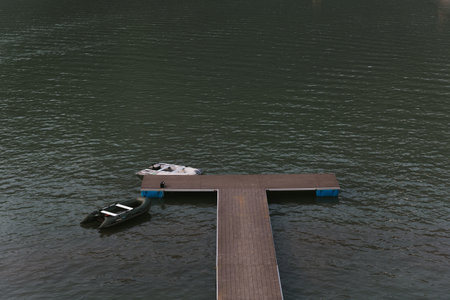 Big Lake Ritsa in Abkhazia with boatsの写真素材