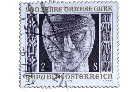 closeup image of postal stamp which old sculpture as motivの写真素材