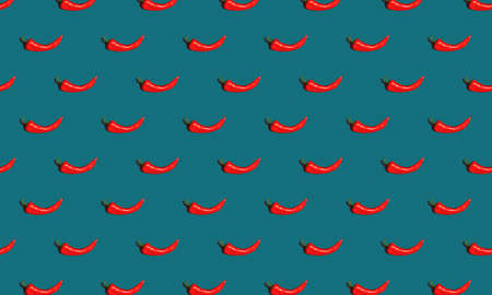 Seamless pattern made with red pepper over blue background. Colorful food backdrop. Minimal...