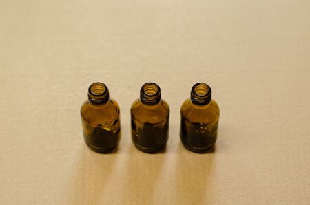 Empty glass medicine bottles