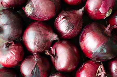 Organic red onion background. Top view. Bulb onion setの写真素材