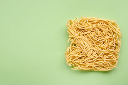 Noodles on green with copy space.の写真素材