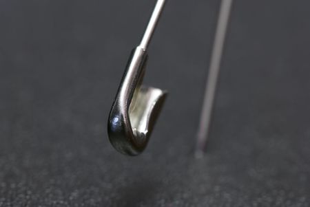 macro safety pin shallow dept of fieldの写真素材