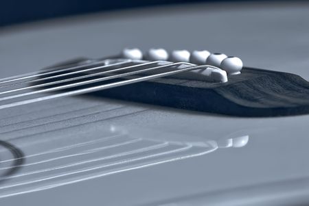 acoustic guitar close up shallow dept of field