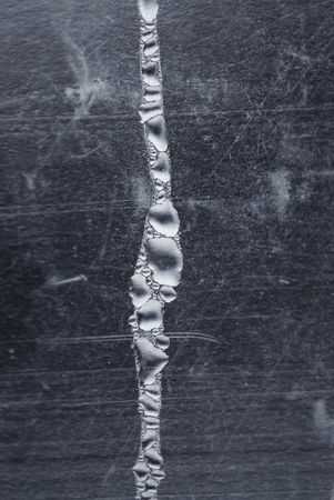 macro of water drops at grunge metal surfaceの写真素材