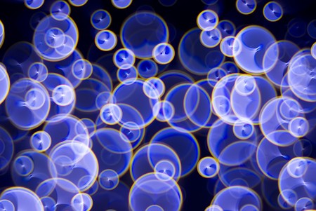 Abstract surrealistic background. Lights and blur. Monocle lens usedの写真素材