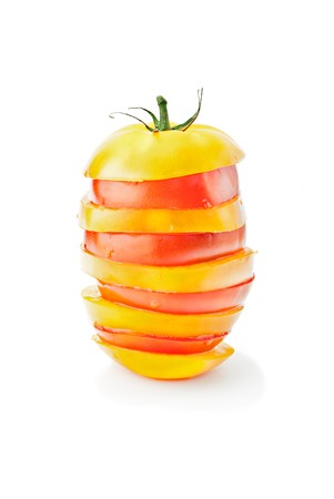 Fresh vitamin background, Red & yellow tomato mix in pyramidの写真素材