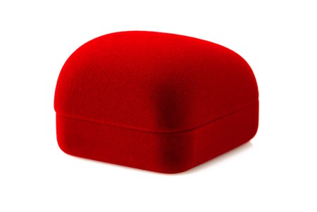 Closed red velvet gift box over whiteの写真素材