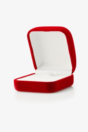 Open empty red velvet gift box over whiteの写真素材