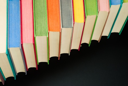 Lot of colored hard covered used booksの写真素材