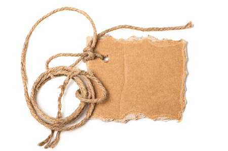 Piece of cardboard and rope with space for your text on white background の写真素材