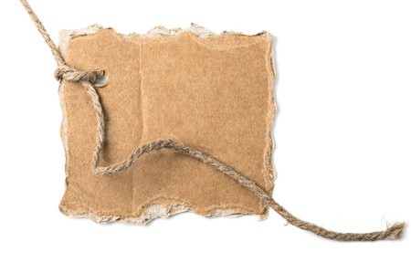 Piece of cardboard and rope with space for your text on white backgroundの写真素材