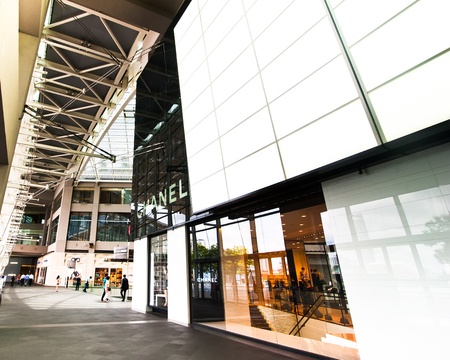 SINGAPORE - FEBRUARY 26: Chanel boutique at Marina Bay Sands Resort shopping centre with most expensive boutiques, restaurants and luxury store. Most attractive for businesss and shoppind tourist in biggest financial developing Asian city state. Singaporeのeditorial素材
