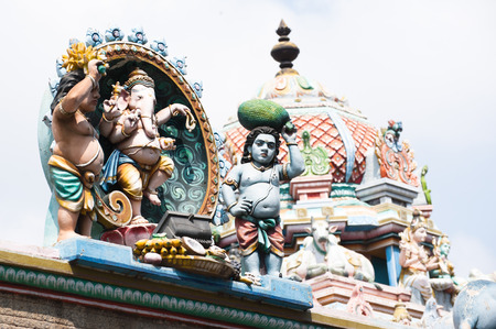 Hindu religious art. Ancient statue pantheon of Gods at Temple gopura (tower) facade. South India, Tamil Naduの写真素材