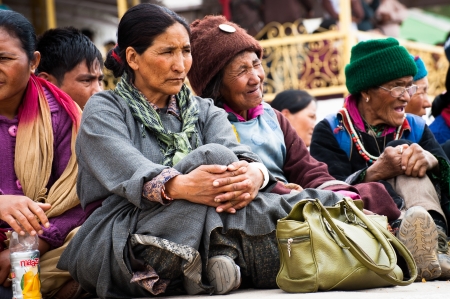 LEH, INDIA - SEPTEMBER 08, 2012: Unidentified Tibetan people in traditional clothes enjoying folk...