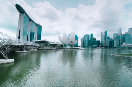 SINGAPORE - FEBRUARY 26  Urban landscape with Museum of Fine Arts and Helix Bridge on Febr 26, 2013  Modern skyscrapers of business district Marina Bay Sands at most financial developing Asian cityのeditorial素材