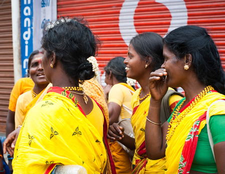 TRICHY, INDIA - FEBRUARY 14:  Indian women in colorful sari at crowded of Indian city on Febr 14, 2013. South India, Tamil Nadu, Thanjavur (Trichy)のeditorial素材