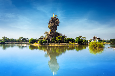 Amazing Buddhist Kyauk Kalap Pagoda under blue sky. Hpa-An, Myanmar (Burma) travel landscapes and destinationsの写真素材