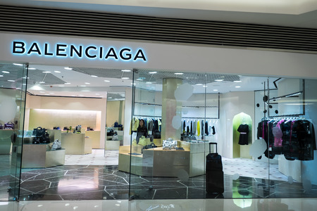 HONG KONG - 22 JAN, 2015: Balenciaga fashion boutique display window with mannequin in luxury clothes and accessories for exclusive shopping. Founded in 1919 by Cristobal Balenciaga, Spanish designerのeditorial素材
