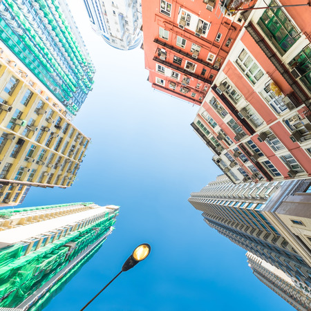Abstract futuristic cityscape view with modern apartment building skyscrapers. Hong Kongの写真素材