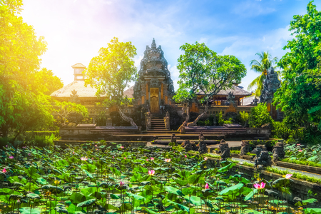 Amazing view of pond with lotus flowers near Pura Saraswati Hindu temple in Ubud, Bali, Indonesiaの写真素材