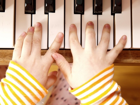 Child Playing Piano の写真素材
