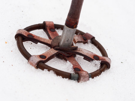 Old Cross Country Ski Pole in Snowの写真素材