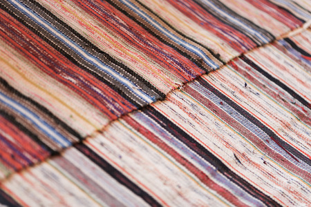 Colorful carpets with stripes on the floorの写真素材