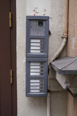 A doorbell box on a wall