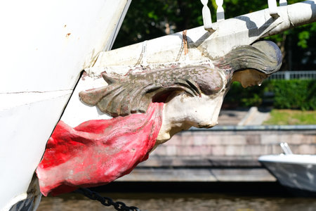 A mermaid figure head on a sailing ship