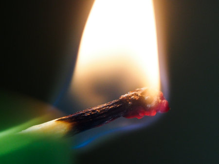 Match burning with a flameの写真素材