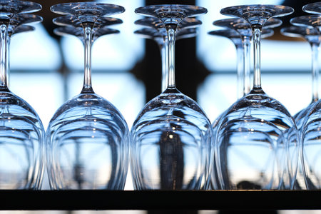 Lots of Wine Glasses on a Shelfの写真素材