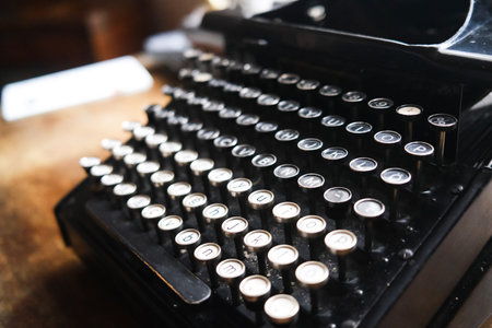 Old typewriter on a wooden deskの写真素材