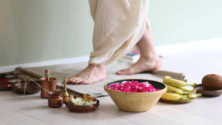 Hindu puja ritual with flowers and fruitsの写真素材