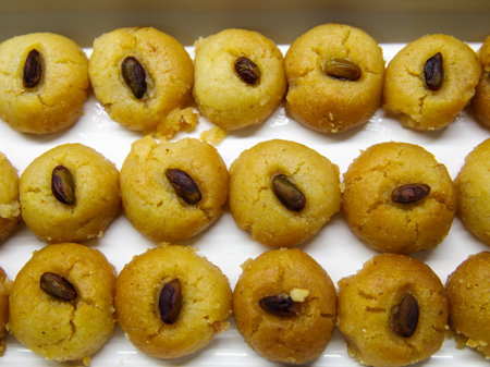 Turkish Dessert Sekerpare. Small cakes with Almond and Sherbet Syrup, top viewの写真素材