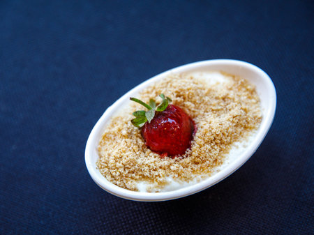 Traditional delicious Turkish milk nut Dessert, Keskul - Pudding. close up, top viewの写真素材