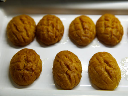 Turkish Dessert Sekerpare. Small cakes with Sherbet Syrup, top view.の写真素材