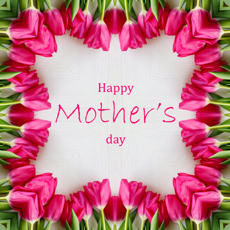 Happy mother's day inscription with frame made from pink red fresh tulips on white background. Top view flat lay, square format. greeting card with textの写真素材