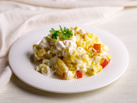 Homemade Potato salad with apple and cheese on white plate. Healthy diet food.の写真素材