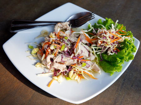 Boiled Pork with Lime, Garlic and Chili Sauce Moo Ma nao, spicy salad, Thai foodの写真素材