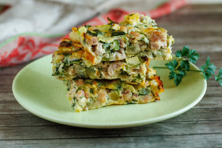 Zucchini chicken casserole. Dietary, low-calorie fitness food. Home Casserole from courgettes with chicken and cheese, homemade foodの写真素材