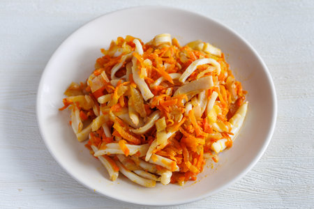 Korean food Stir-fried Squid, Squid stir-fried with onions, carrots in a spicy sauceの写真素材