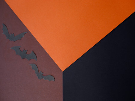 Creative cube layout made of orange, brown, black paper. Concept scene stage showcase. Minimalistic styleの写真素材