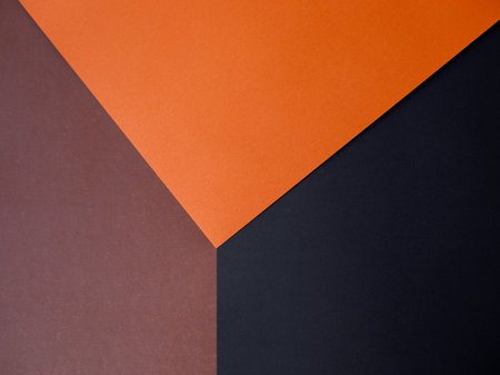 Creative cube layout made of orange, brown, black paper. Concept scene stage showcase. Minimalistic styleの写真素材