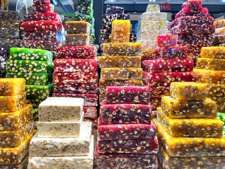 pyramids of Turkish delight is arranged in confectionery. The assortment includes a variety of flavors, textures and colors, from traditional lokumの写真素材