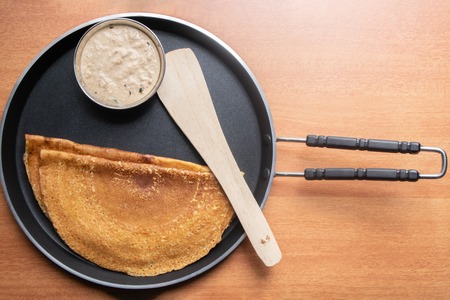 Maida Dosa with Coconut chutney in tawa, south Indian breakfast.の写真素材