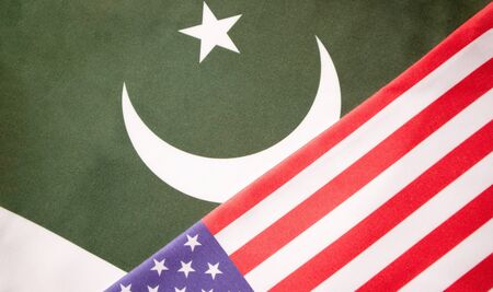 Concept of Bilateral relationship between two countries showing with two flags: United States of...