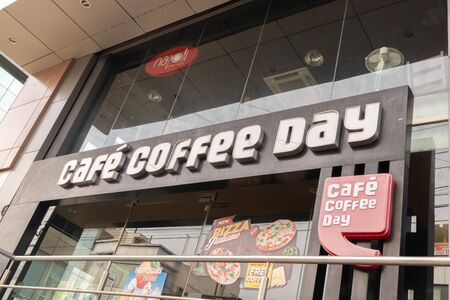Bengaluru, India June 27,2019 : Front view Bill board of Cafe Coffee Day shop building at Bengaluruのeditorial素材